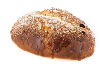 Eindejaarsbrood met rozijnen, suiker en marsepein