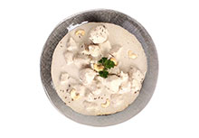 Kip in Indische cashewnotenroomsaus